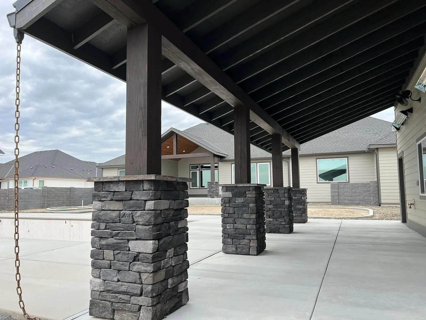 Masonry-clad column bases in an Alano Masonry exterior project